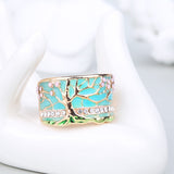bague arbre de vie couleur azur et dorée